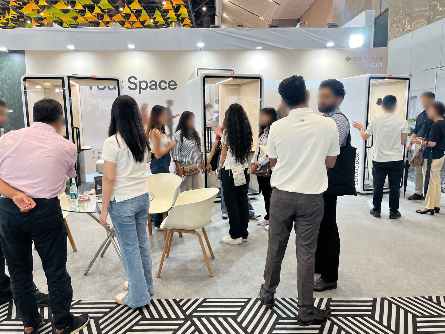 Architects and workplace professional viewing Soundbox acoustic pods at INDEXPLUS Delhi 2026