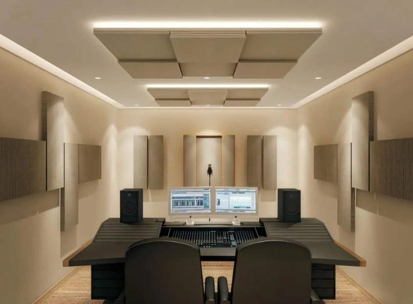Acoustic panels installed across the walls and ceiling of a recording studio